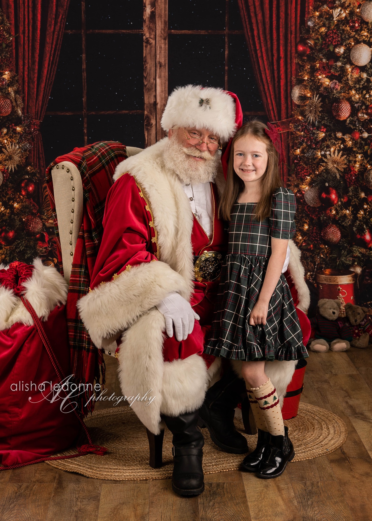 Young girl smiling with Santa Claus
